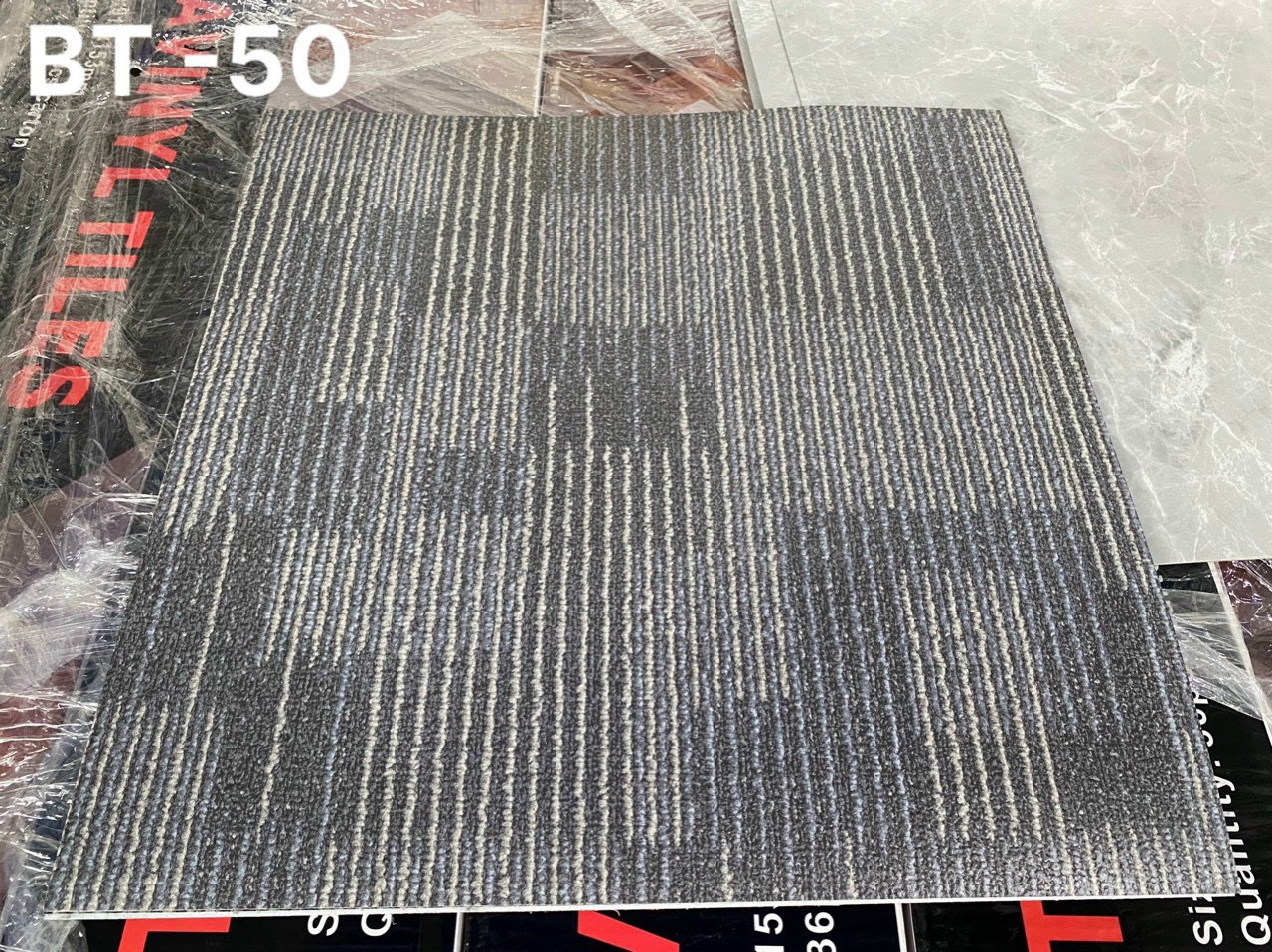 SÀN NHỰA KEO DÁN VÂN THẢM MÃ BT50